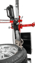 Coats Maxx 90 Leverless Bead Lifter tool head close-up on alloy wheel