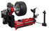 Coats Heavy Duty Tire Changer with commercial truck tire mounted, side angle view