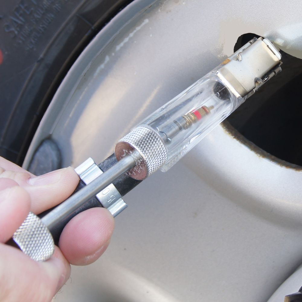 Martins Industries MIC-AUHD-52 Tire Inflation Cage - close-up of open chuck connecting to tire valve stem