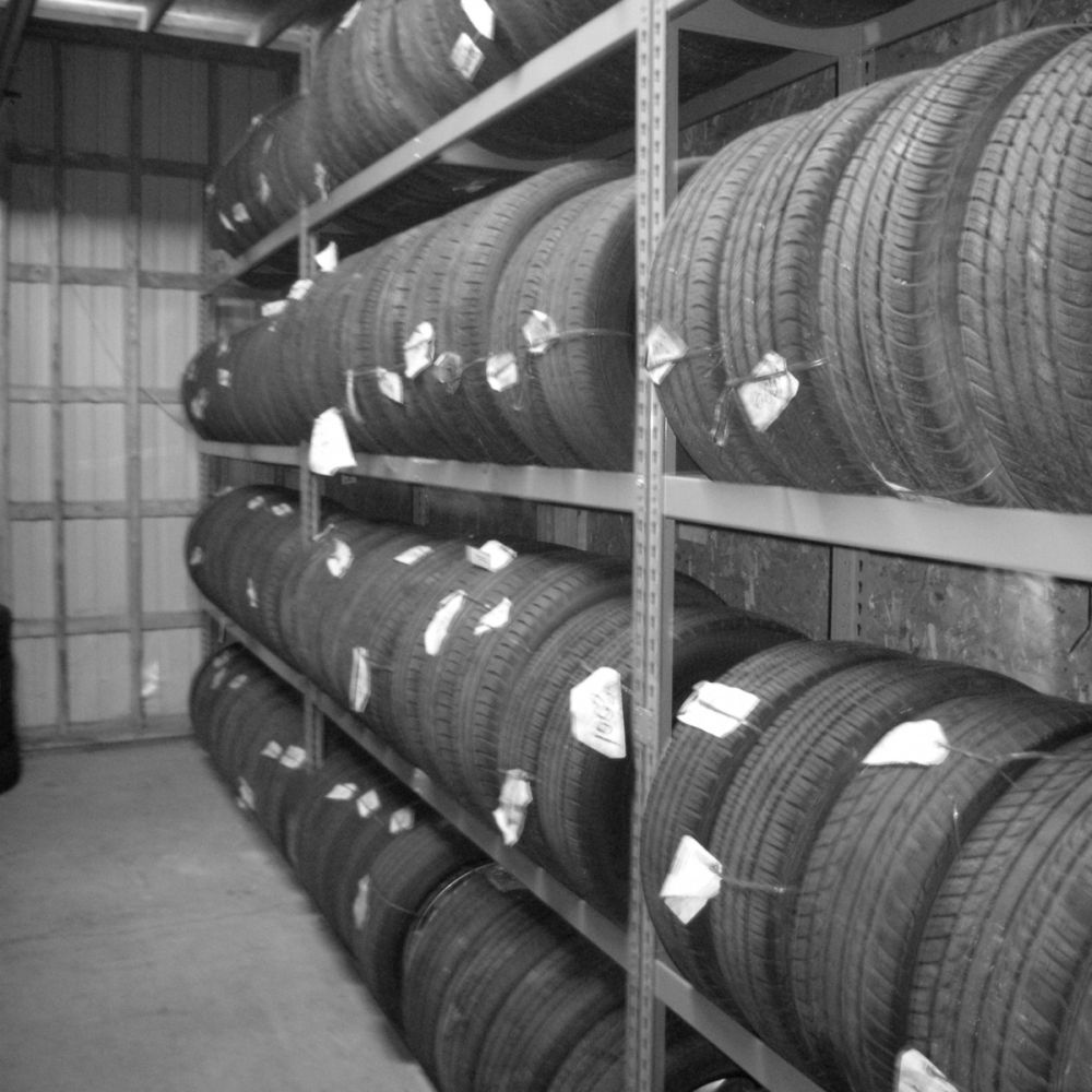 Martins Industries MTSR-4 4-Tier Tire Storage Rack in use at a tire shop storage room