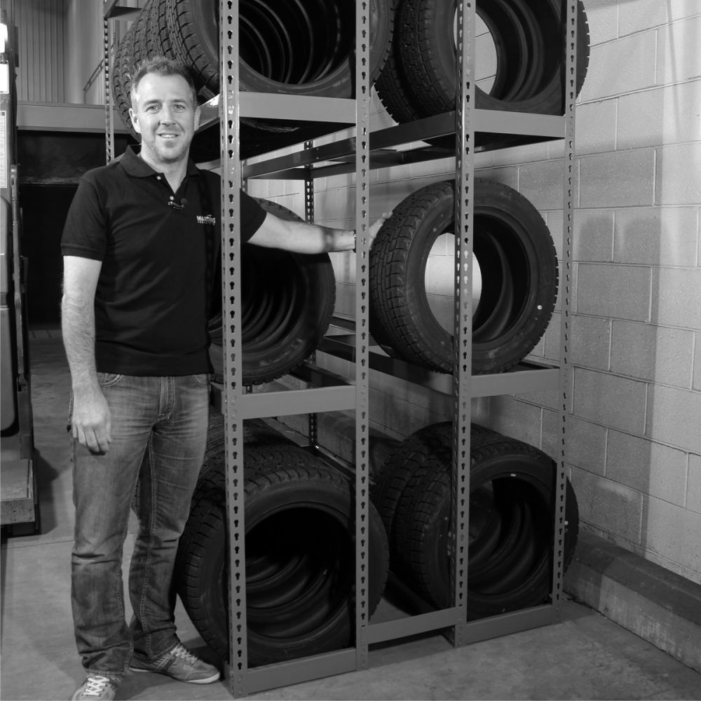 Martins Industries MTSR-5 5-Tier Tire Storage Rack displayed in a warehouse setting with tires loaded on tread