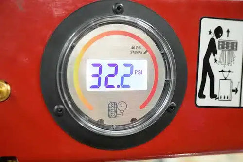 Coats Maxx 80 digital inflation gauge displaying 32.2 PSI closeup