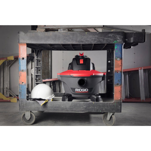 Ridgid 62698 RT0600 Wet/Dry Vac stored on a job site utility cart