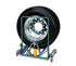 Gaither Tool Y471106 SAFERGO Truck Wheel Dolly holding a mounted truck tire on dolly frame