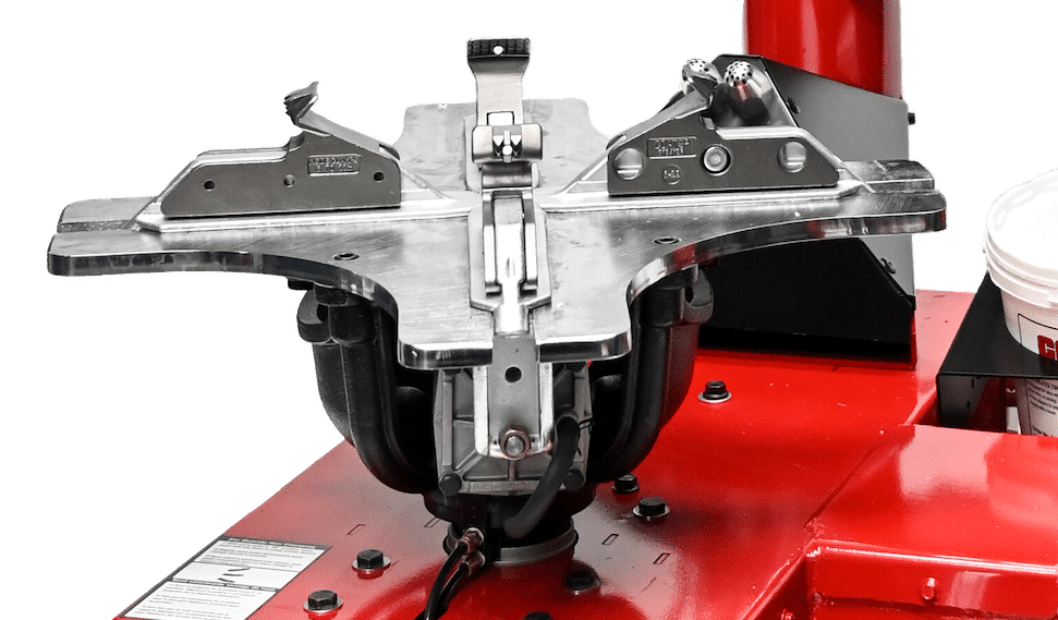 Coats Maxx 70 tabletop 4-position rim clamps close-up view