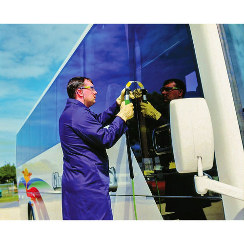 Technician using Equalizer BTB WK10HD Air Tool to remove glass on a bus