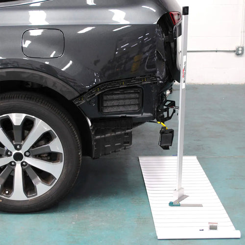 Autel ADASBAT Blind Spot Aiming Tool Kit in use next to vehicle rear bumper during sensor calibration