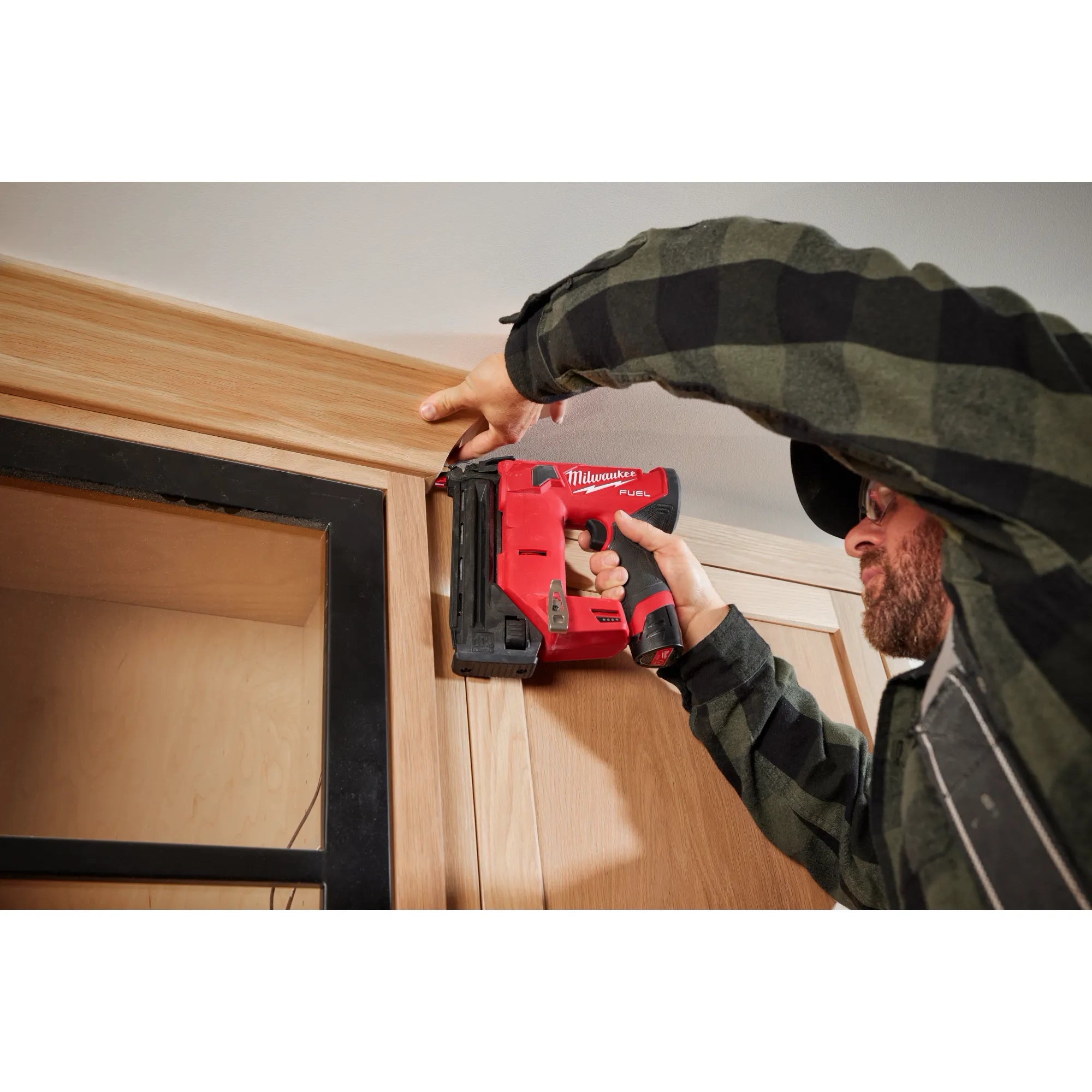 Milwaukee Tool 2541-20 M12 FUEL 18 Gauge Compact Brad Nailer - in-use lifestyle photo