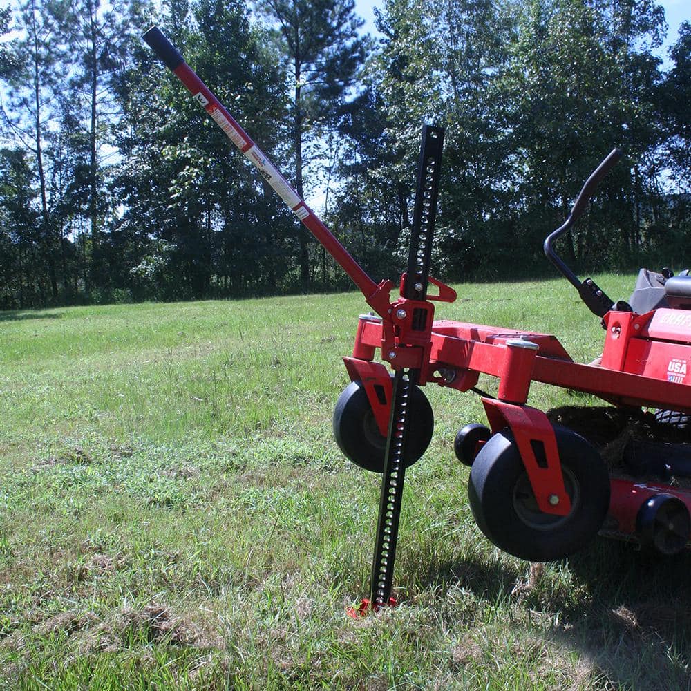American Power Pull 14100 48 in. 4-Ton Farm Jack in Use on Farm Equipment Outdoors