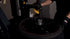 Coats APS 3000 roller disc bead loosener in operation on alloy wheel