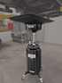 JohnDow Industries JD-2436 Big Mouth Transmission Drain Pan in use under vehicle in service bay