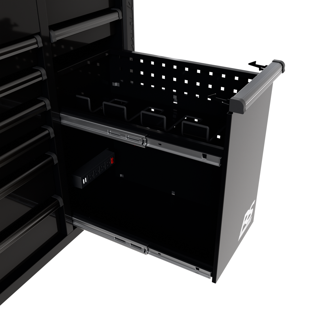 Homak RS Pro Power Tool Drawer close-up showing built-in power strip, battery holders, and perforated divider panel in Midnight Black