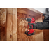 Milwaukee Tool 3601-20 M18 Compact Brushless Drill/Driver drilling in tight overhead space with LED light on