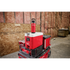 Milwaukee PACKOUT 24oz Insulated Bottle mounted on PACKOUT modular storage system on jobsite