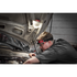 Milwaukee Tool 2012R Rechargeable Magnetic Headlamp worn by mechanic working under vehicle hood