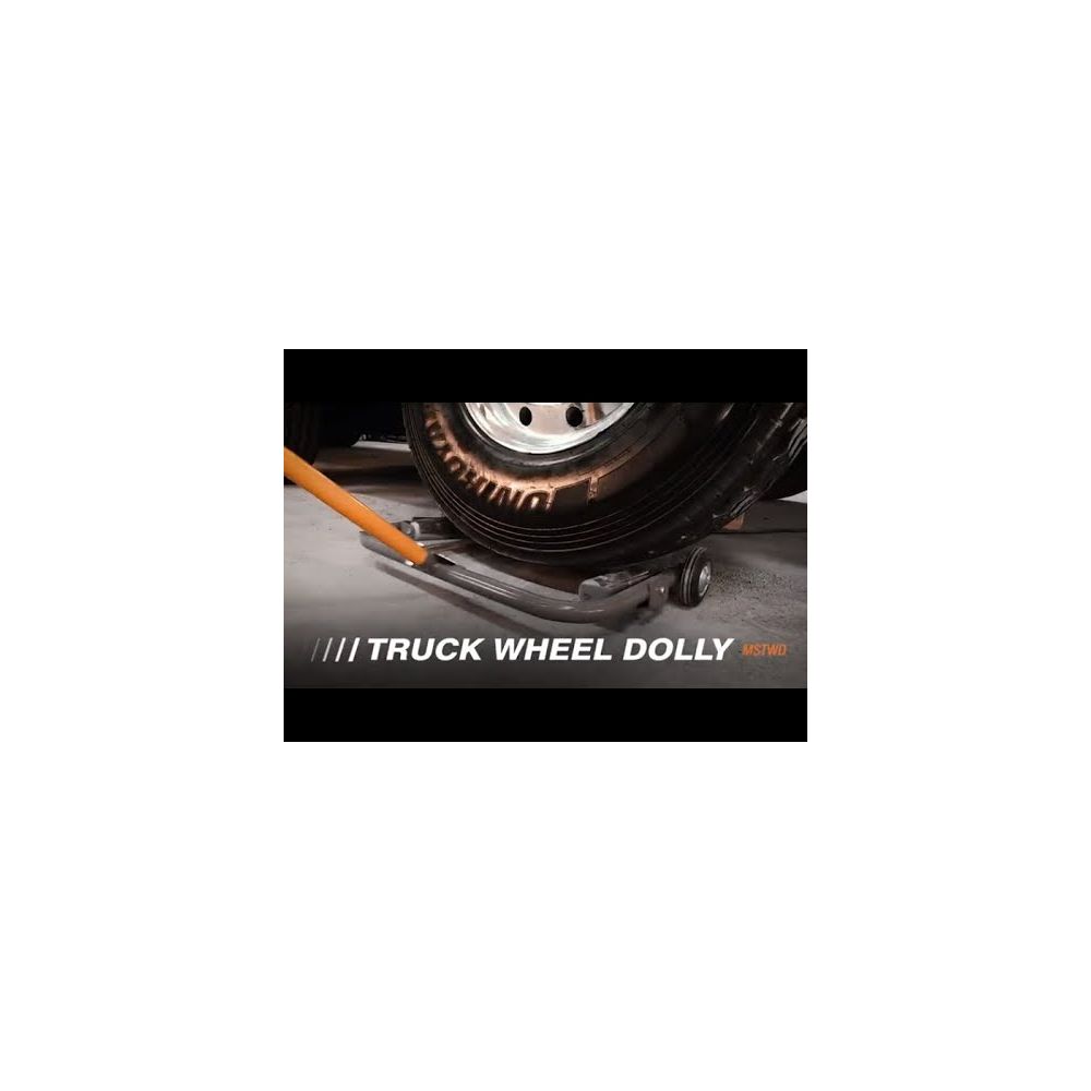 Martins Industries MSTWD Truck Wheel Dolly in use supporting a heavy truck tire on a workshop floor
