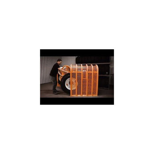 Martins Industries MIC-6HD-IPS Tire Inflation Cage in use with large truck tire in a shop setting