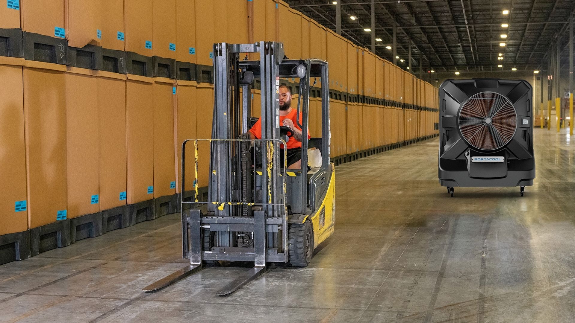 Portacool Apex 4000 Evaporative Cooler in use in a warehouse alongside forklift operator