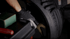 Close-up of wheel weight placement using the Coats 1600 balancer