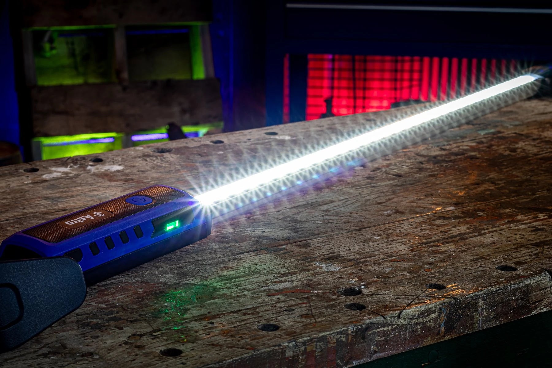 Astro Pneumatic 151SL underhood light glowing on workbench with battery indicator lit