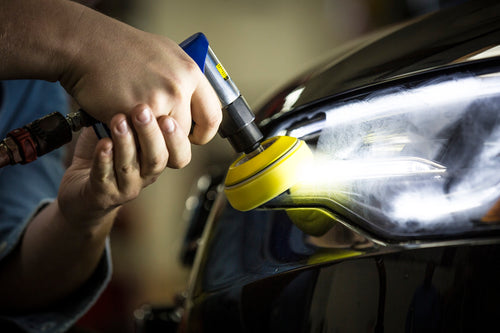 Astro Pneumatic mini air polisher in use buffing automotive headlight panel