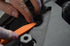 Astro Pneumatic 4505 trim tool being used to remove a vehicle panel fastener - action shot