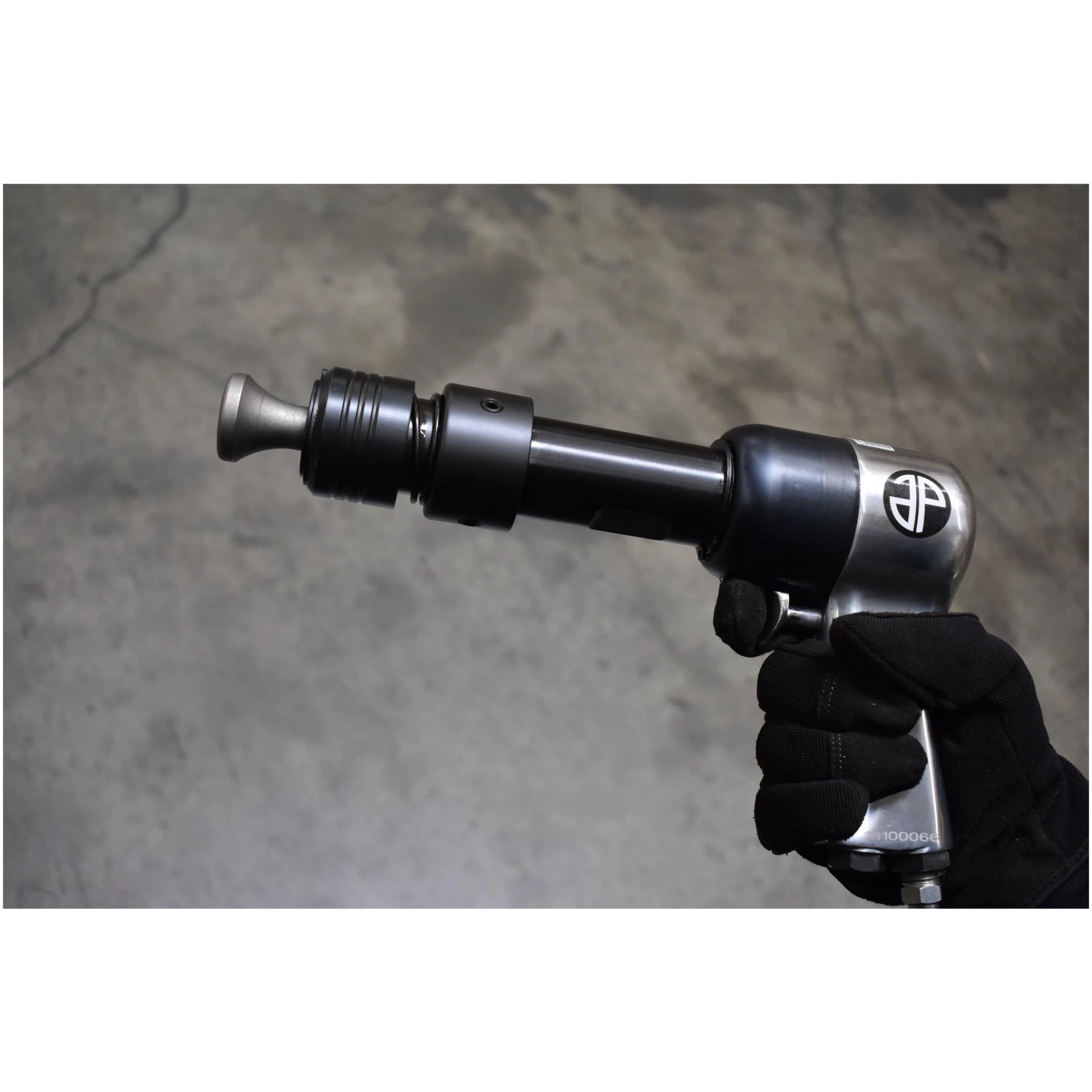 Astro Pneumatic 49801 Quick Change Retainer Chuck mounted on air hammer side view