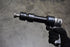 Astro Pneumatic 49801 Quick Change Retainer Chuck installed on air hammer in use