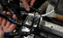Astro Pneumatic 9409A Hose Clamp Pliers in use inside a vehicle engine bay