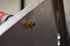 Rivet nut being set into metal panel using the Astro Pneumatic ADN14 drill adapter