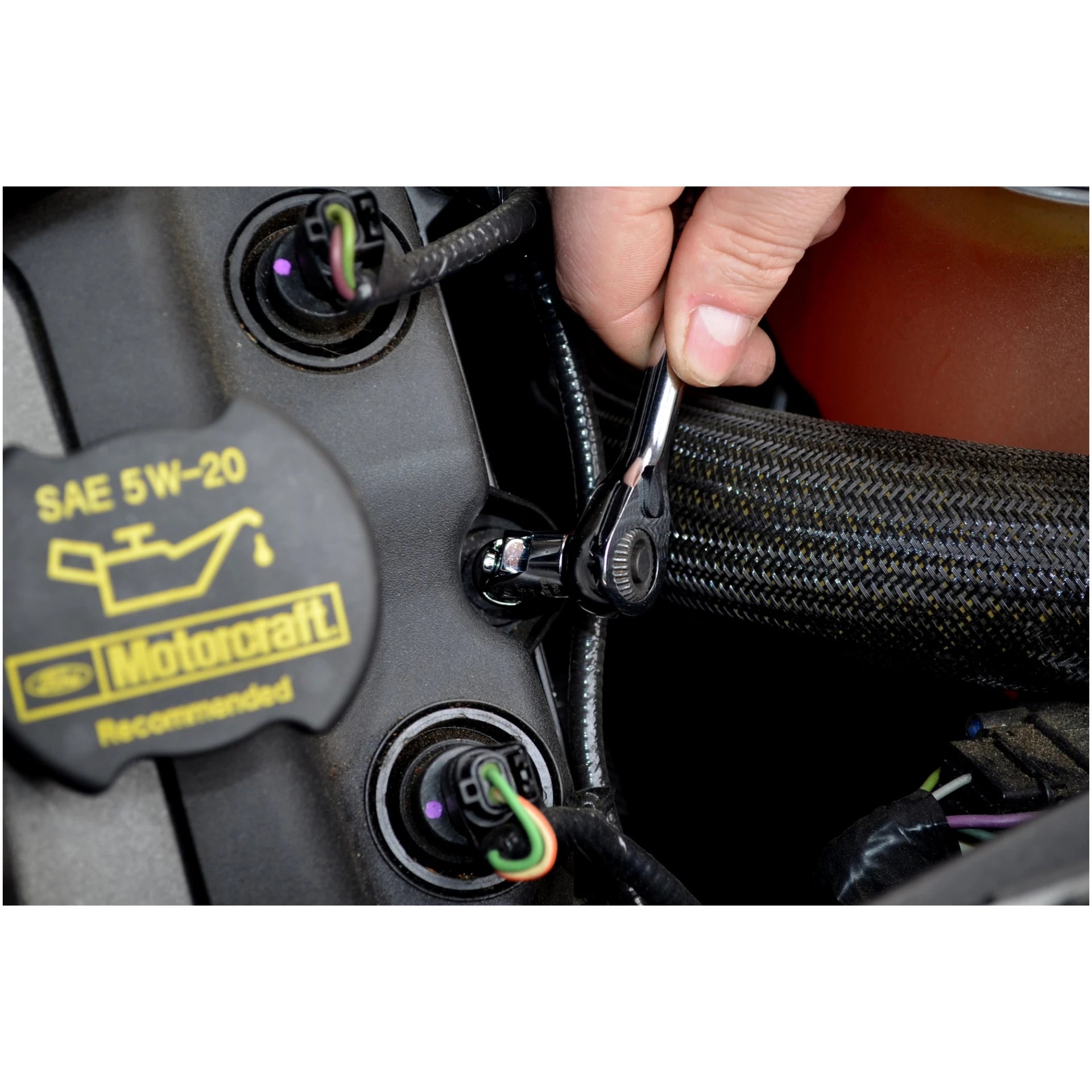 Astro Pneumatic 7412 flex socket accessing tight engine bay fastener close-up