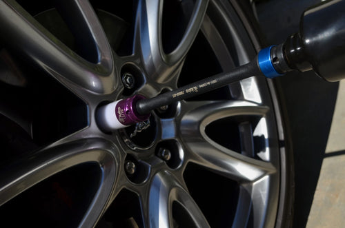 Astro Pneumatic 78810 torque limiting extension in use on vehicle alloy wheel