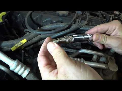 Astro Pneumatic 94404 spark plug socket in use removing spark plug from engine bay
